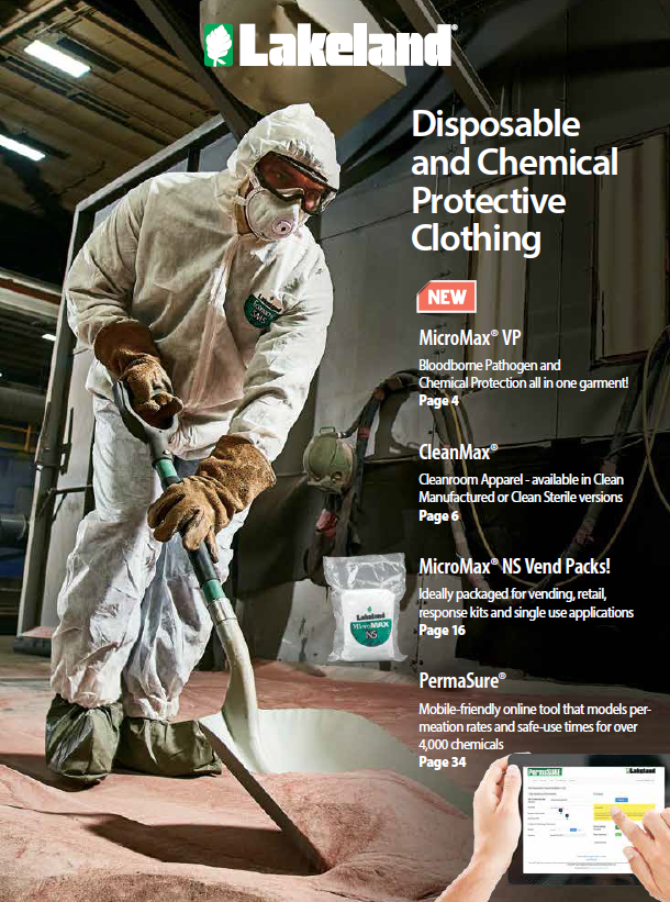 Worker wearing protective clothing using vacuum in factory.